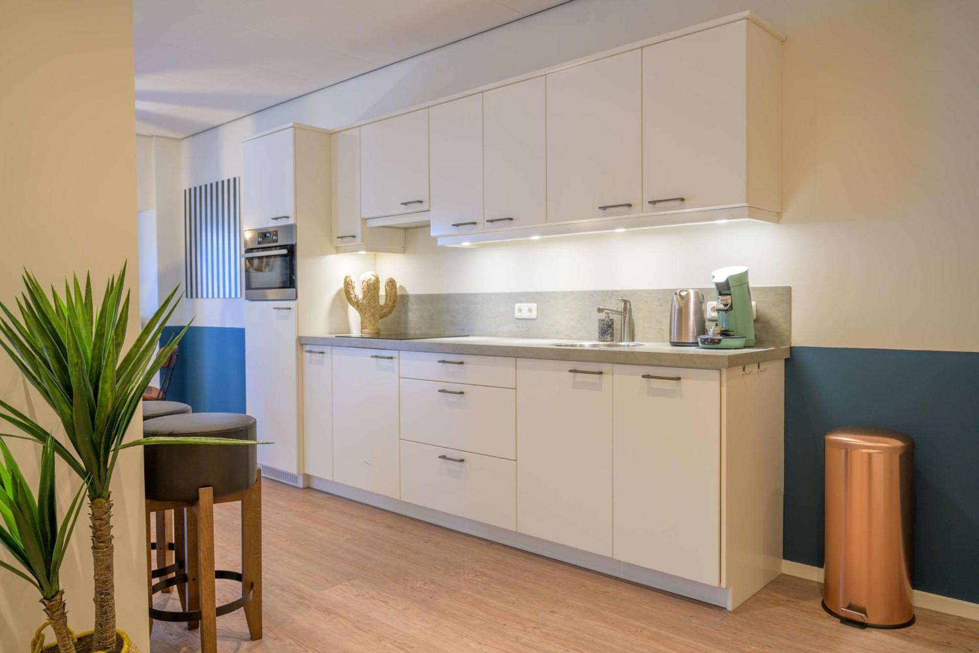Two-Bedroom Apartment with Four Single Beds and Balcony